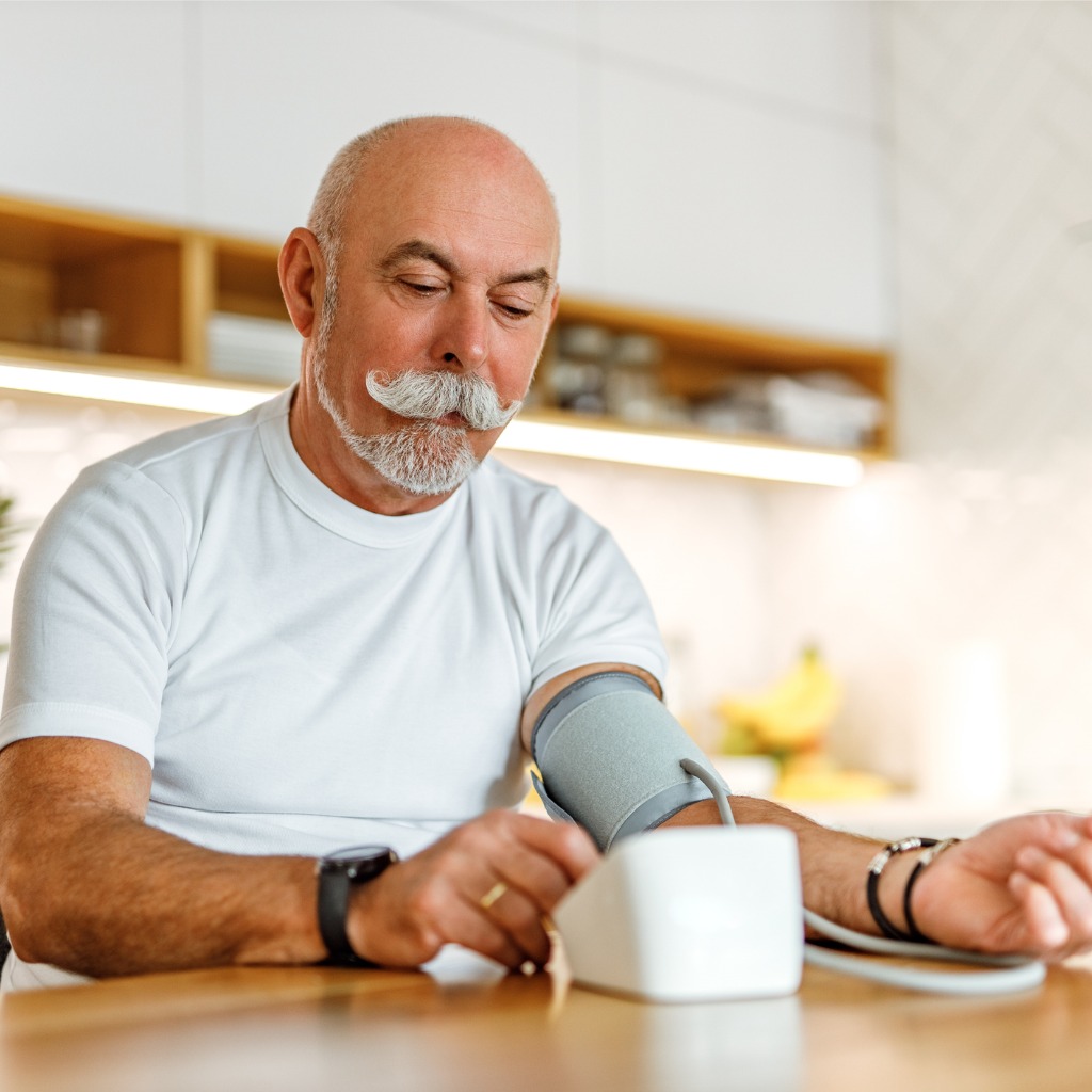 man measuring blood pressure