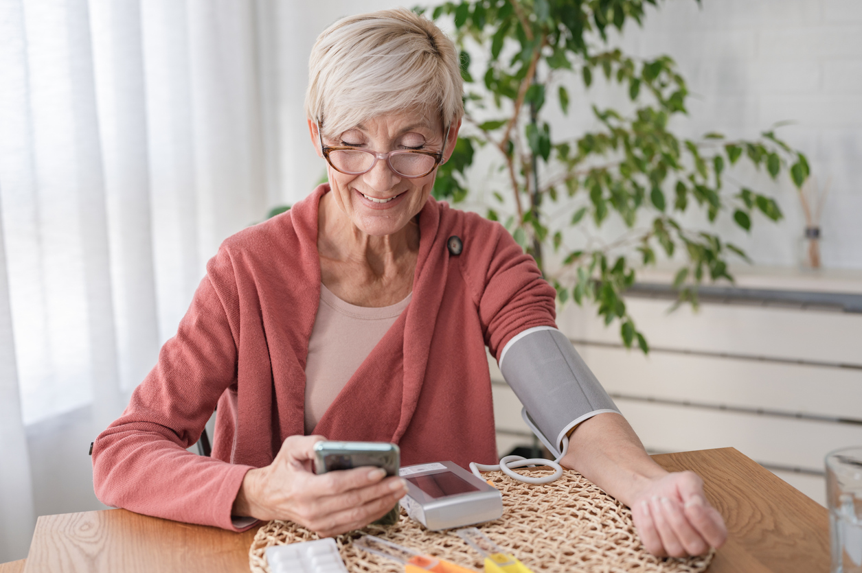 woman using health device at home